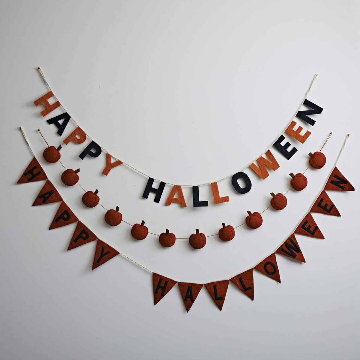 Creative Co-Op 72"L Handmade Wool Felt Pennant Banner "Happy Halloween", Orange Color & Black