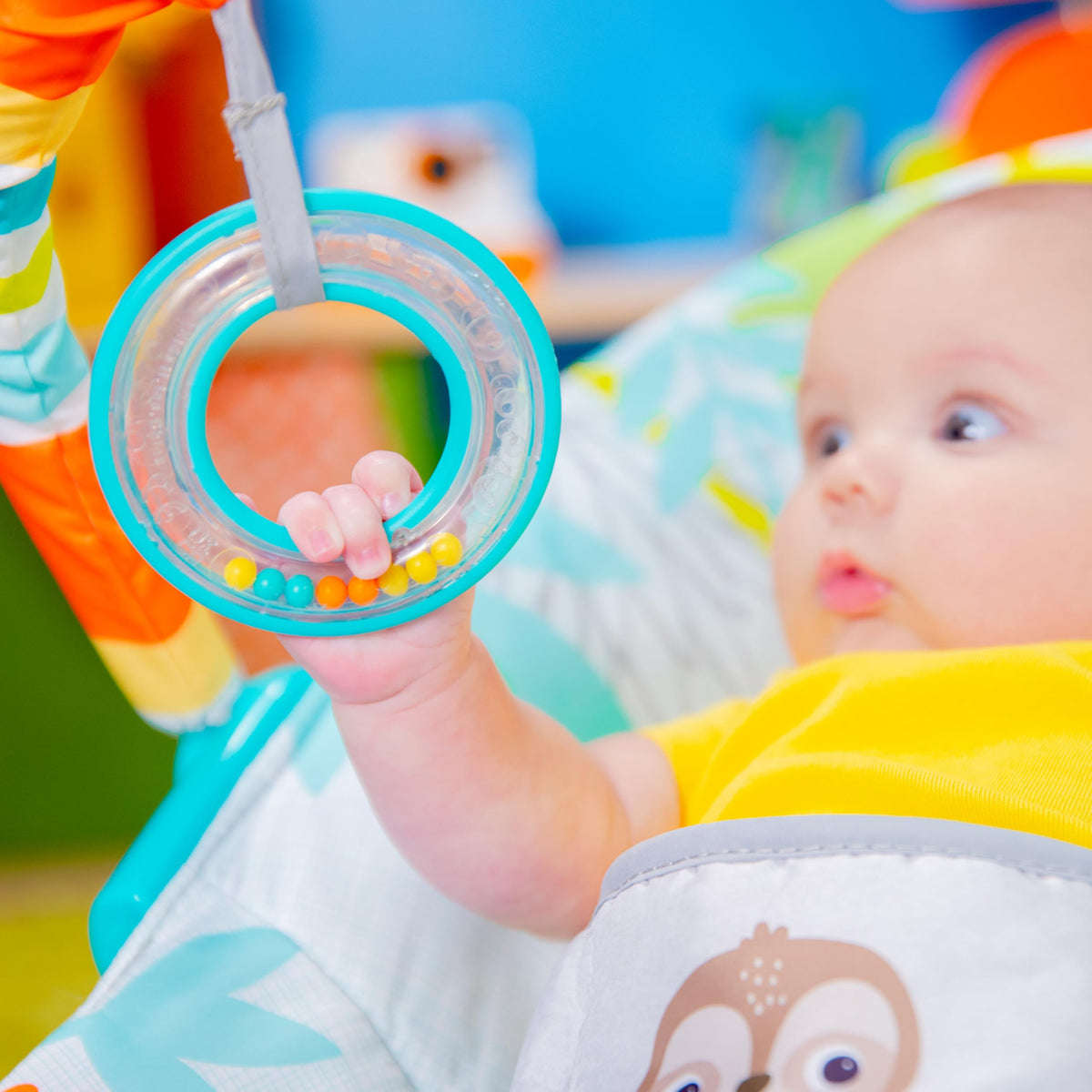 Bright Starts Rainforest Vibes 3-Point Harness Vibrating Baby Bouncer with -Toy bar 🍁 All In One Marketplace Canada